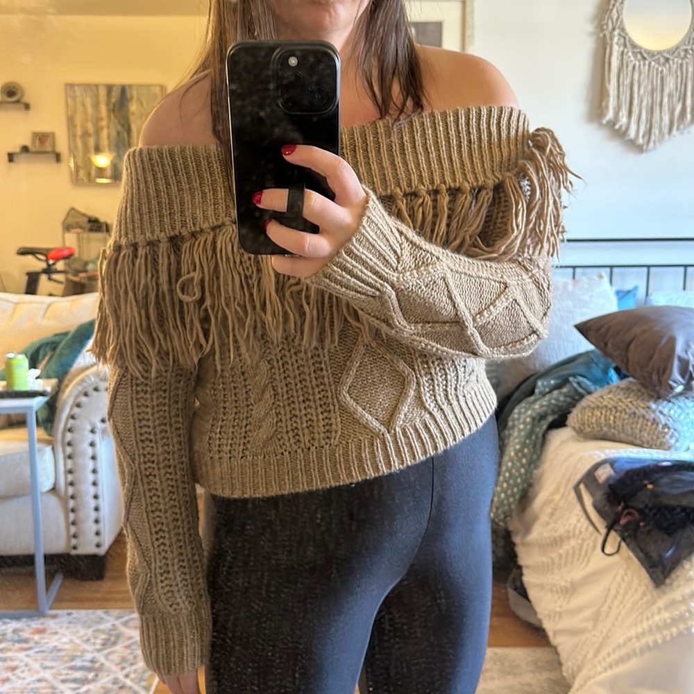 Never been worn off shoulder sweater